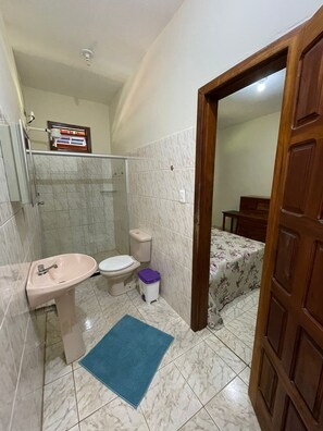 Shower, towels, toilet paper