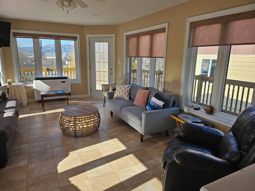 Solarium overlooking city, river and mountains. Sometimes Northern lights.