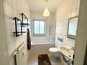 Hair dryer, towels, soap, toilet paper