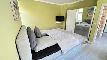 2 Schlafzimmer, BĂŒgeleisen/BĂŒgelbrett, kostenloses WLAN, BettwĂ€sche