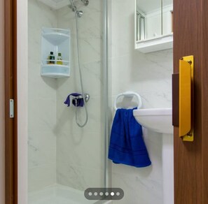 Hair dryer, towels, soap, shampoo