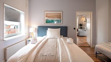 2 slaapkamers, een strijkplank/strijkijzer, reisbedje, gratis wifi