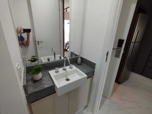 Shower, towels, toilet paper