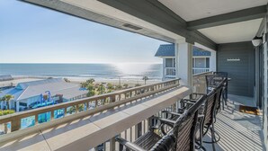 A balcony with a view of the beach and ocean. - Ocean and sunrise views that have you coming back year after year! (Myrtle Beach)