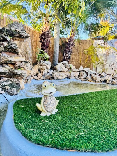 Tropical Luxury Retreat with warm Pool, 5-bedroom & Mini Golf, Impact Windows