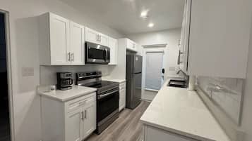 Microwave, oven, stovetop, coffee/tea maker