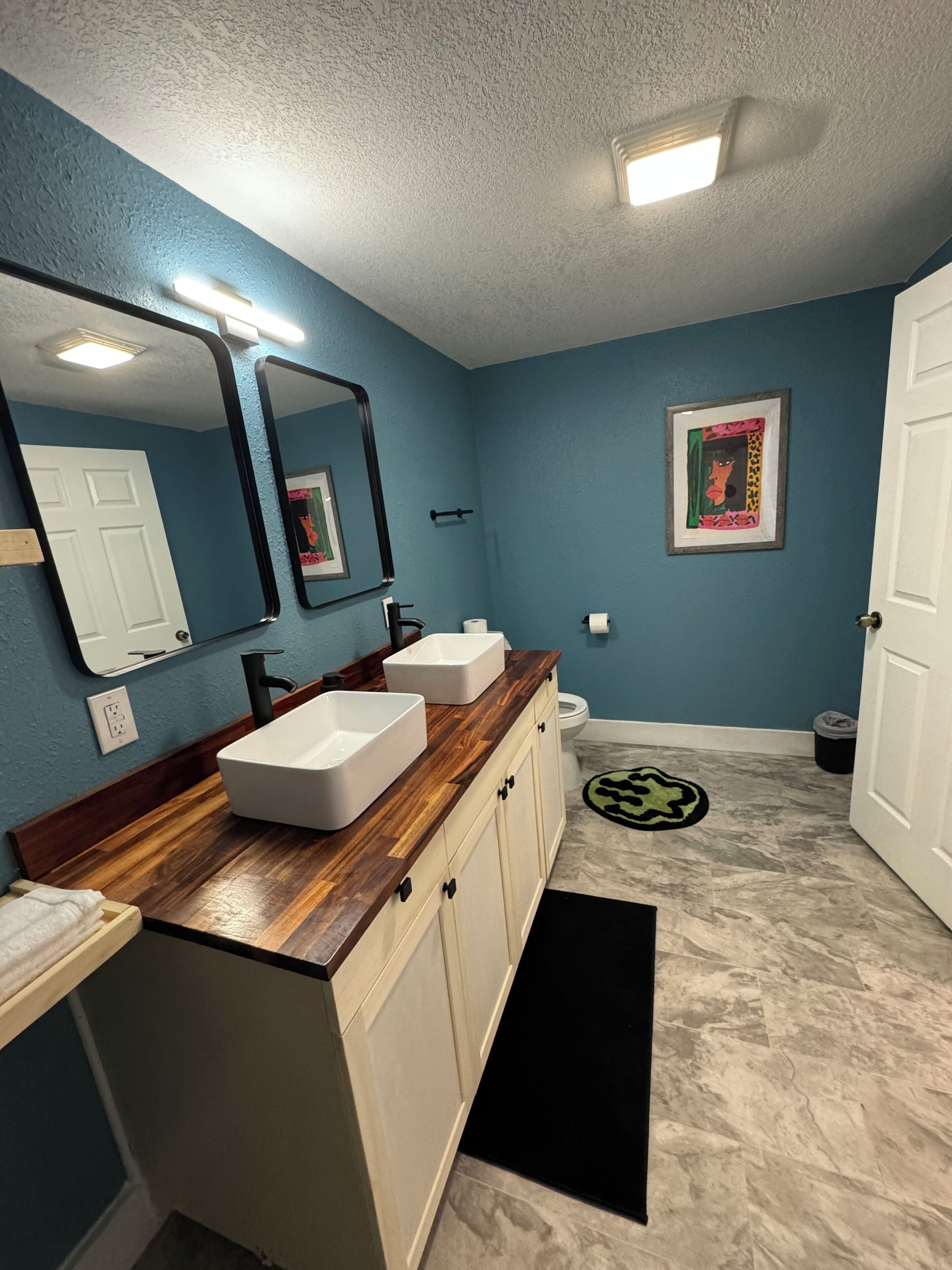Shower, towels, soap, toilet paper