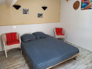 2 bedrooms, desk, iron/ironing board, travel crib