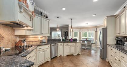 Luxury 6 BR's/ 5.5 BA with a Pool, 3-car Garage, Fiber Wifi, & Fully Furnished