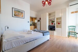 1 chambre, fer et planche à repasser, Wi-Fi, literie fournie
