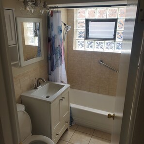 Hair dryer, towels, soap, toilet paper