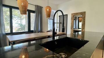 Villa | Private kitchen | Fridge, microwave, oven, dishwasher