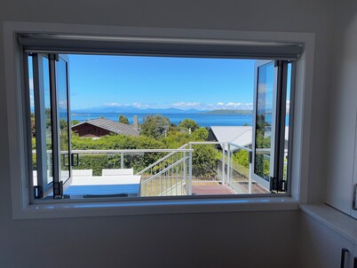 CENTRAL, QUIET, LOCATION WITH STUNNING LAKE AND MOUNTAIN VIEWS.