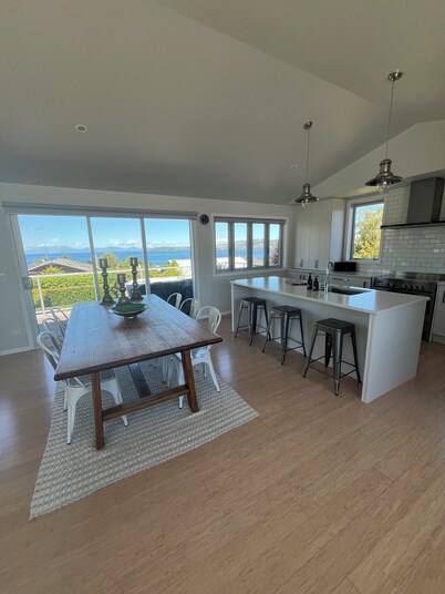 HILLTOP, CENTRAL, QUIET, LOCATION WITH STUNNING LAKE AND MOUNTAIN VIEWS.