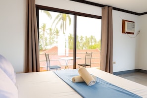 Basic Studio, Balcony, Courtyard View | Laptop workspace, free WiFi