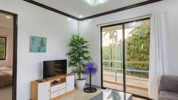 Family Double Room (House2) | Living area | 28-inch flat-screen TV with satellite channels