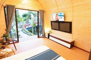 Exclusieve bungalow, uitzicht op tuin | Een minibar, geluiddichte muren, gratis wifi, beddengoed