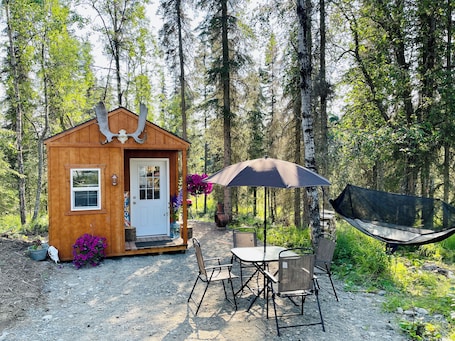 Outdoor dining. Small Dry Cabin Between Kenai and Kasilof Rivers.