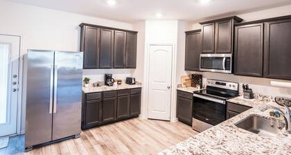 Entire 5B Boho house with game area & workspace, central to popular locations!