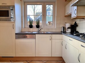 House | Private kitchen | Highchair - Holiday Villa Near Forest, Beach With Sauna (Sint Maartensvlotbrug)