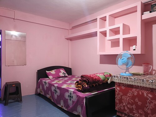 VistaNest: Stunning Mountain & Bangladesh Views with Terrace Access!