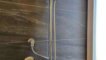 Double Room, Balcony | Bathroom | Shower, hair dryer, towels, soap