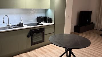 Apartment | Private kitchen | Fridge, microwave, oven, stovetop