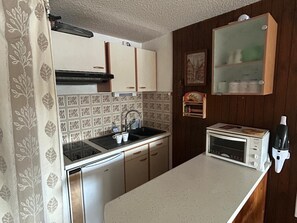 Microwave, stovetop, coffee/tea maker, toaster
