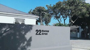 A building with a sign reading "22 Mackay Street". - Steps Guest House (Gqeberha (Port Elizabeth))