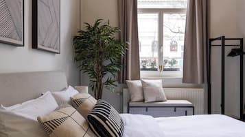 Desk, travel cot, WiFi, bed sheets