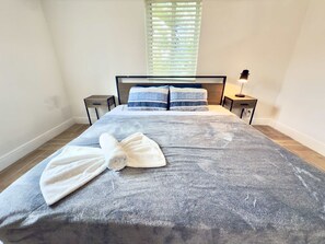 1 bedroom, desk, iron/ironing board, travel cot