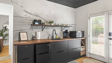 Microwave, coffee/tea maker, cookware/dishes/utensils