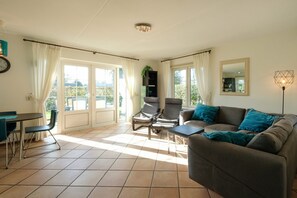 Living room - Luxurious Coastal Villa Near Forest (Sint Maartensvlotbrug)