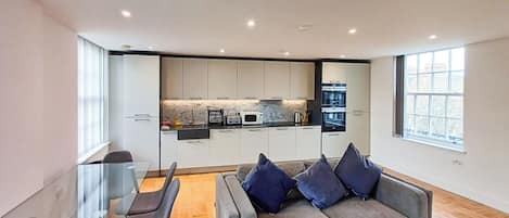 Deluxe Apartment, 2 Bedrooms, Kitchen | Living area