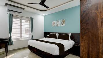 Deluxe Double Room | Premium bedding, desk, blackout curtains, iron/ironing board