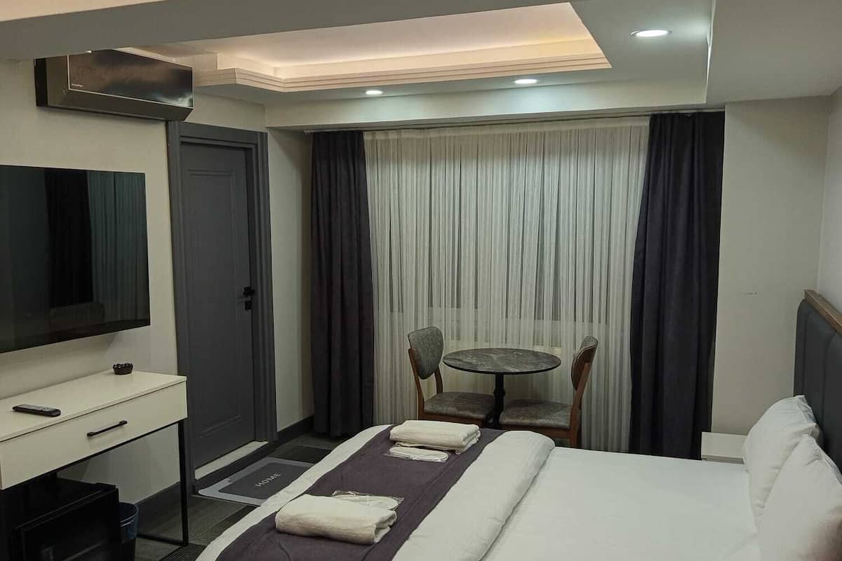 1 quarto, roupas de cama premium, camas Select Comfort, escrivaninha