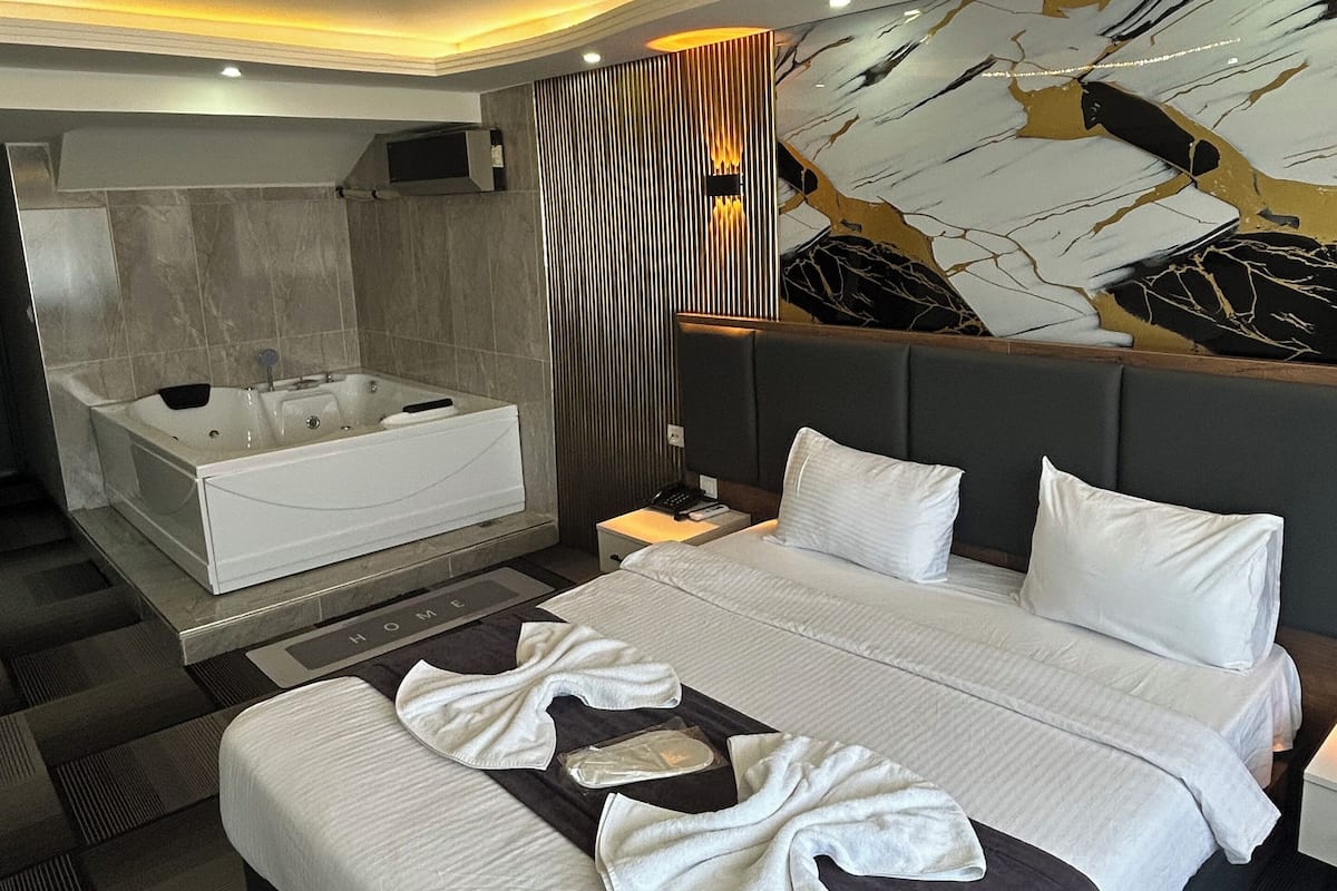 1 quarto, roupas de cama premium, camas Select Comfort, escrivaninha