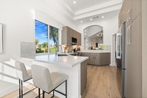 Microwave, oven, stovetop, dishwasher - Stunning 3-Bedroom Condo at Desert Falls CC (Palm Desert)