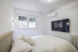 2 habitaciones, tabla de planchar con plancha, wifi y ropa de cama