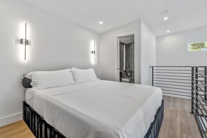 1 bedroom, desk, iron/ironing board, travel crib