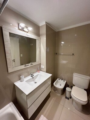 Hair dryer, bidet, towels, soap