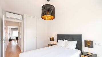 1 dormitorio, tabla de planchar con plancha, Internet y ropa de cama