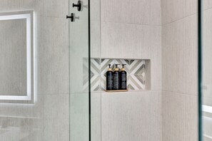 Hair dryer, towels, soap, shampoo