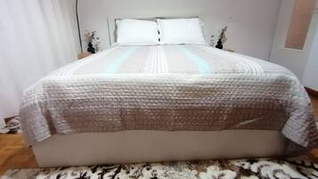 2 dormitorios, tabla de planchar con plancha, wifi