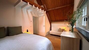 4 slaapkamers, een strijkplank/strijkijzer, beddengoed