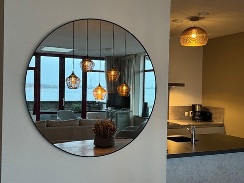 Penthouse met Jacuzzi en Sauna aan het water