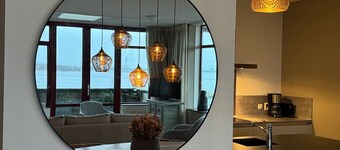 Penthouse met Jacuzzi en Sauna aan het water