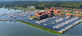 Penthouse met Jacuzzi en Sauna aan het water