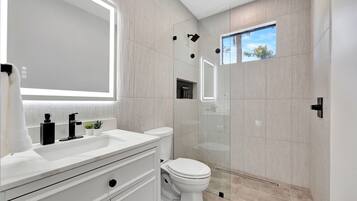 Hair dryer, towels, soap, shampoo