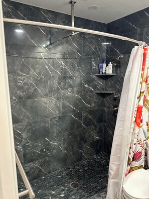 Shower, towels, toilet paper